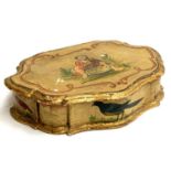 An Italian painted and parcel gilt trinket box, decorated with a man with a basket, the sides