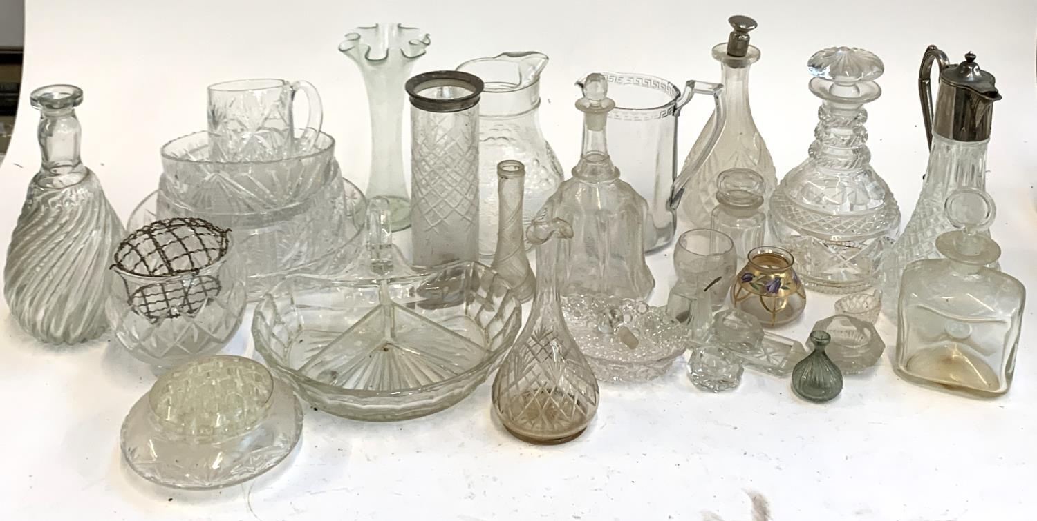 A mixed lot of cut and other glassware to include decanters, claret jug, vase with silver collar,