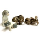 Two Royal Copenhagen puppies, 1407 and 1408; together with two other puppy figurines (4)