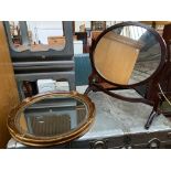 A circular wall mirror, with faux burr wood frame, 47cmD; together with an adjustable dressing