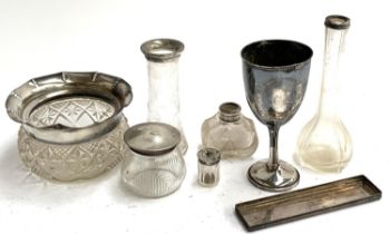 Various silver topped dressing table items, a rectangular silver lid, a silver rimmed cut glass