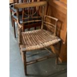 A Regency painted faux bamboo elbow chair, with wicker seat and bobble mouldings, 55cmW