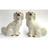 A pair of Staffordshire dogs, highlighted in gilt, each 31cmH, one AF