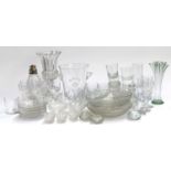 A large quantity of glass and cut glass items to include a set of four wine glasses with cut