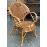 A bamboo and caned conservatory chair