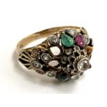A 14ct gold and gemstone set 'Thai Princess' ring, two stones missing, 3.5g, size L 1/2