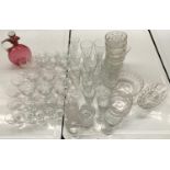 A large quantity of cut and other glass, to include a set of nine crystal wine glasses