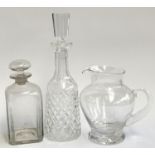 A Dartington crystal jug, 19.5cm high; together with a Waterford crystal decanter, 34cm high; and