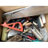 A mixed box of handtools to include saw, rasps, garden tools, etc