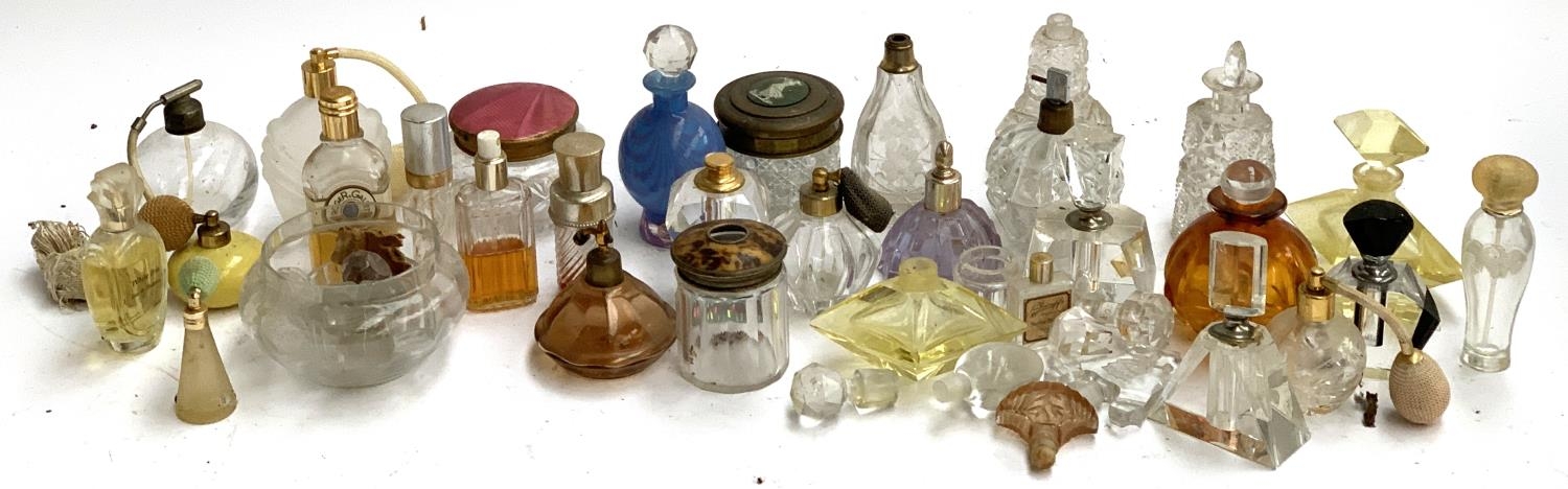 A collection of scent bottles, some art deco, to include Dior, Peter Tysoe Glass, etc