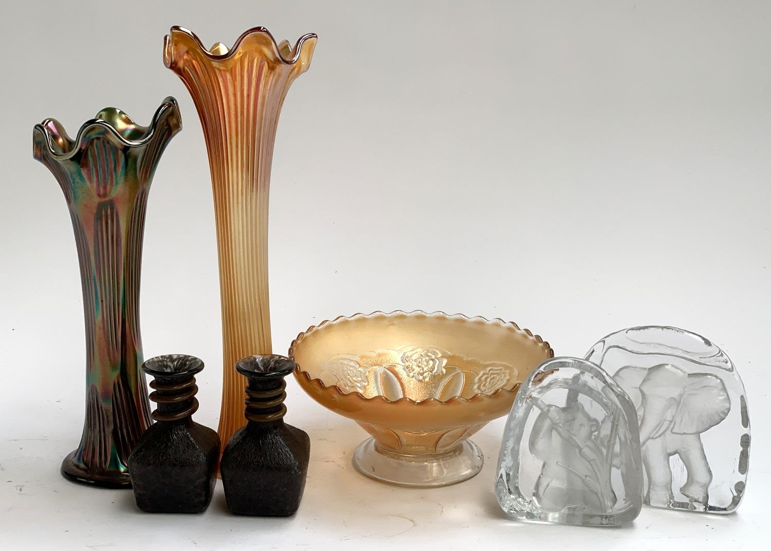 Several carnival glass vases and bowl, the taller vase 34cmH; two pressed glass plaques depicting