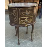 A brown painted and parcel gilt oval occasional table, 74cmH