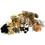 A large quantity of teddy bears in the form of various animals to include Koala, rabbit, monkey,