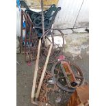 A mixed lot of cast iron and other items to include 2 pairs of bench ends, a shepherd's hut wheel,