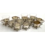 A set of eight engraved glasses with plated Peruzzi holders