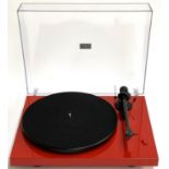 A Pro-ject Debut Carbon II turntable, with carbon arm