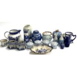 A mixed lot of blue and white, mainly Oriental ceramics, to include ginger jar, sake bottles,