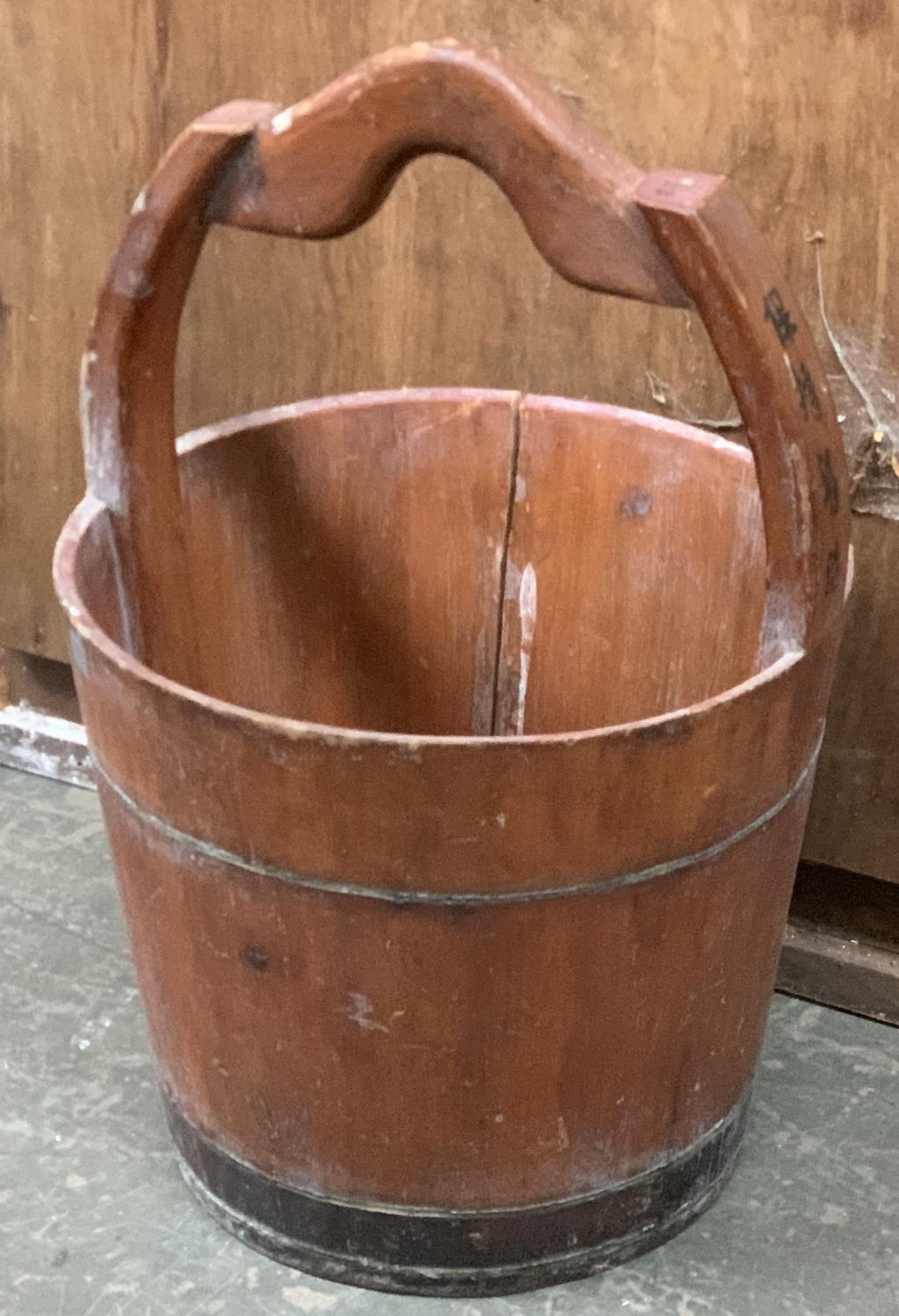 A Chinese rice bucket, of staved construction, painted with goldfish, 61cmH