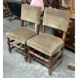 A pair of oak and upholstered side chairs, on peripheral stretchers