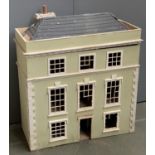 A green three storey dolls house of 6 rooms, in need of restoration, approx. 79x33x89cmH