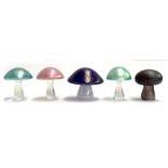 Five iridescent art glass toadstools, to include Isle of Wight, the widest by Langham Glass, 7.5cmW