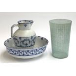 A Furnivals blue and white washbowl and jug, 39cmD; together with a glass vase, 31cmH