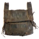 A leather satchel with apotropaic symbols