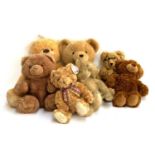 A quantity of teddy bears, to include Steiff style with moveable limbs and head, the largest bear