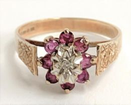 A 9ct gold, ruby and diamond ring, 2.3g, approx. size O