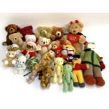 A large quantity of small teddy bears and stuffed toys, to include hand knitted doll, etc