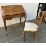 A 20th century French marquetry and ormolu mounted bureau de dame, fall front over three drawers, on