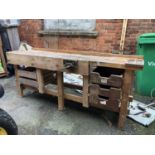 A wooden workbench with record vice and drawers, 193x53x80cmH