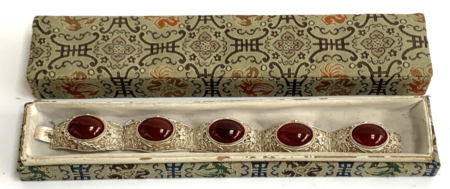 An early 20th century Chinese export silver filigree bracelet set with carnelian cabochons, with - Image 4 of 4