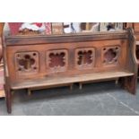 A 19th century oak church pew, moulded top rail with four open panels, 108cmH 201cmW