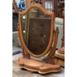 A Victorian mahogany shield shape adjustable dressing mirror, 62cmW