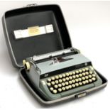 A Smith Corona Sterling typewriter in hard case