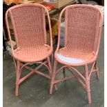 A pair of pink painted Lloyd Loom style chairs