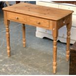 A pine side table with two frieze drawers, 91x44x76cmH