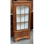 A glazed standing corner cupboard, 72cmW 145cmH