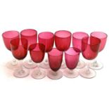 Eleven hand blown clear stemmed cranberry glasses (11)