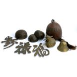 Three Chinese copper bells, together with one other larger; a further brass bell; brass figure of