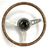 A Moto Lita wooden rimmed steering wheel, the central hub marked Astrali 1978