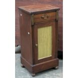 A mahogany ormolu mounted bedside cabinet, with single drawer over a cupboard with pleated silk