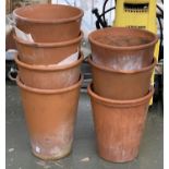 A set of seven terracotta plant pots, each approx. 24cmD