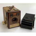 A Kodak Brownie Flash IV camera, together with a Vest Pocket autographic Kodak