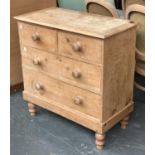 A small Victorian pine chest of two short over two long drawers, on turned legs, 84x43x86cmH