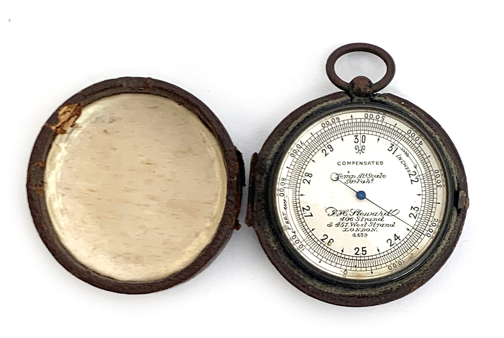 A brass pocket aneroid barometer, signed J H Steward,, 406 Strand, London, in fitted leather case,