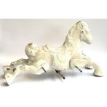 A cast metal rocking horse, missing base, approx. 94cmL