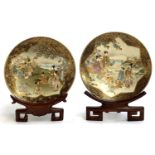 A pair of Japanese satsuma plates depicting women and children with Mt Fuji in backgrounds,