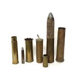 A lot of seven shell cases, one with head, the tallest (51cmH) was recovered from the Somme, the sma